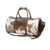 Schneiders cowhide leather duffle bag with real hair-on-hide design and brown leather sides – Jacket Journey