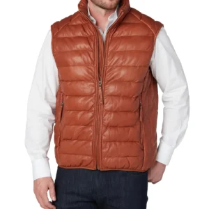 Man wearing a cognac leather puffer vest with front zipper, stand collar, and two pockets
