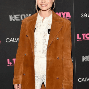 Robbie Harley suede coat in brown with lapel collar and buttoned closure