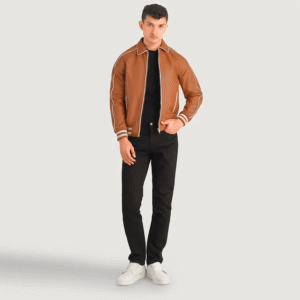 Tan brown leather varsity jacket with shirt collar, raglan sleeves, and quilted lining