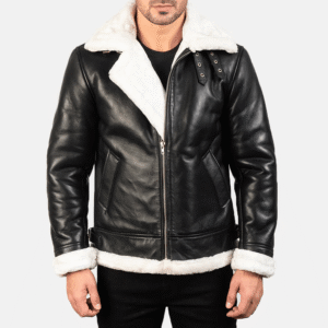 Black and white leather bomber jacket with buckled collar, faux fur lining, and roll-back cuffs.