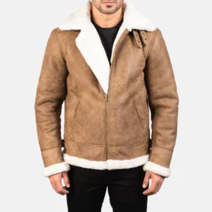 Distressed brown leather bomber jacket with faux fur lining, buckled collar, and roll-back cuffs.