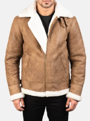 Distressed brown leather bomber jacket with faux fur lining, buckled collar, and roll-back cuffs.