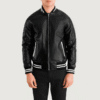 Pascal Black Leather Varsity Jacket Black leather varsity jacket with varsity collar, rib-knit cuffs, and welted waist pockets