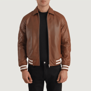 Brown leather varsity jacket with shirt collar, rib-knit cuffs, and quilted polyester lining